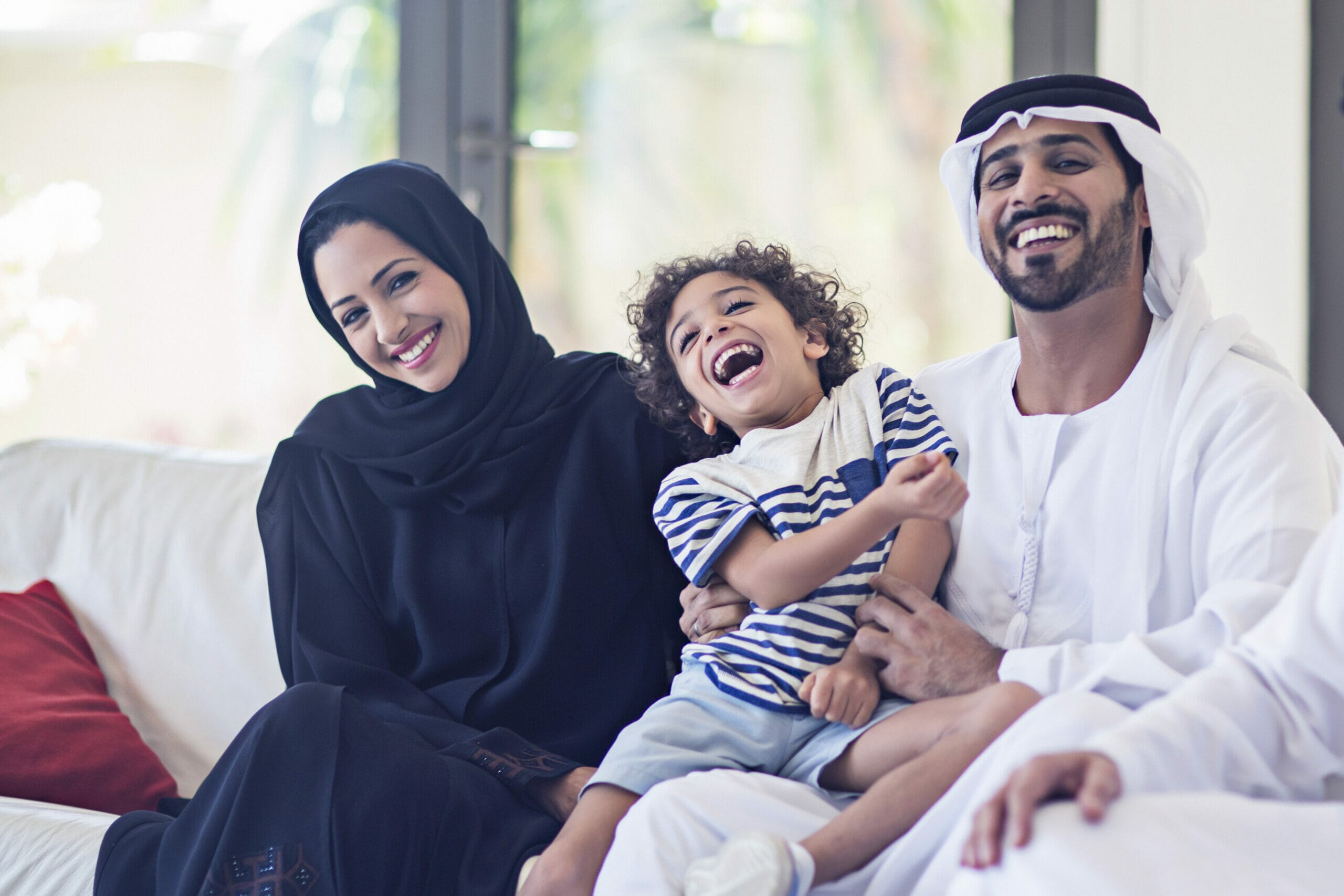 Emirati family portrait Portrait of a middle eastern family looking at the camera.